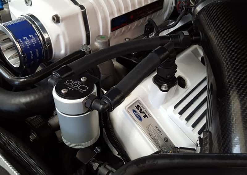 J&L — J&L 07-14 Ford Mustang GT500 Driver Side Oil Separator 3.0 - Clear Anodized
Oil Separator - view 1
