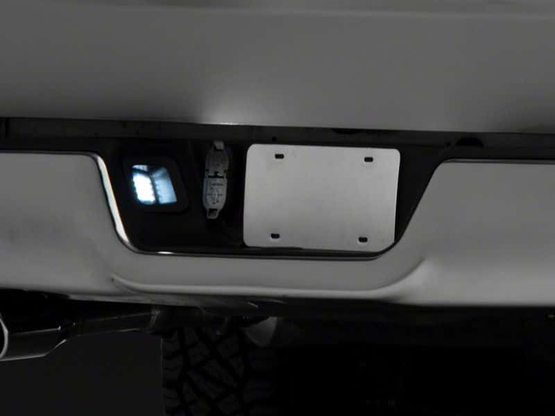 Raxiom — Raxiom 13-18 Dodge RAM 1500 Axial Series LED License Plate Lamps- Smoked
Bulbs - view 6