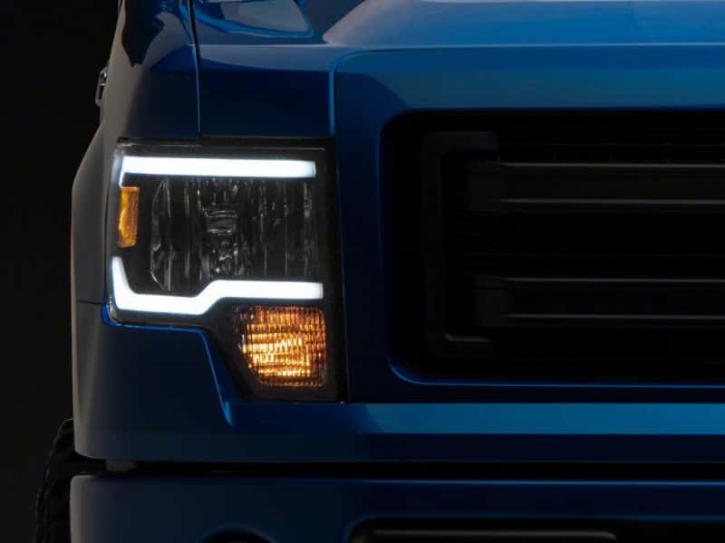 Raxiom — Raxiom 09-14 Ford F-150 Axial Series Headlights w/ LED Bar- Blk Housing (Clear Lens)
Headlights - view 2