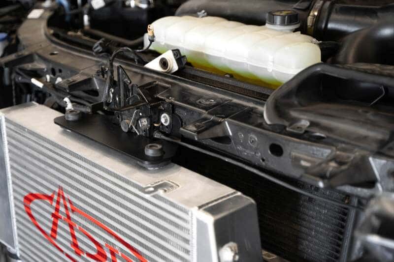 Addictive Desert Designs — Addictive Desert Designs 17-18 Ford F-150 Raptor aFe Intercooler Upgrade Kit
TChrgrIcoolerMount - view 10
