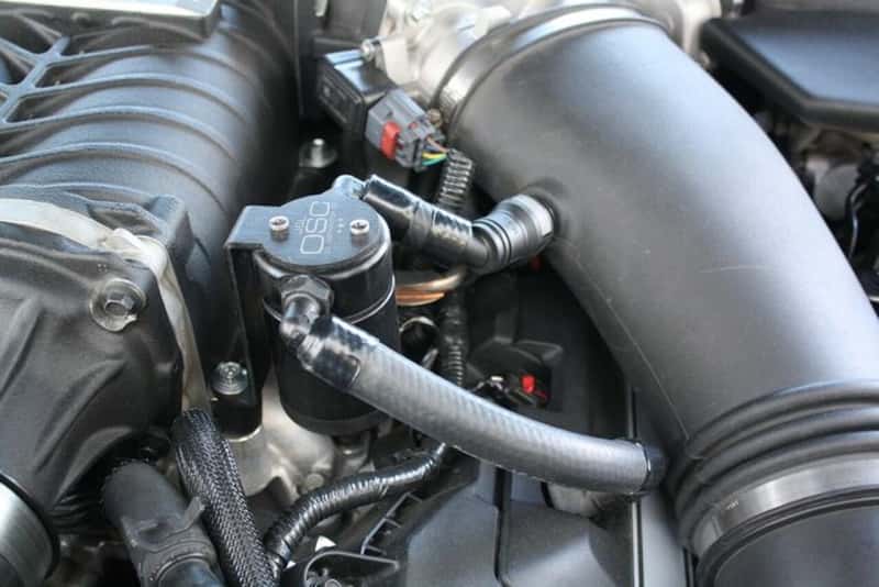 J&L — J&L 11-17 Ford Mustang GT (w/Roush/VMP Supercharger) Driver Side Oil Separator 3.0 - Black Anodized
Oil Separator - view 2