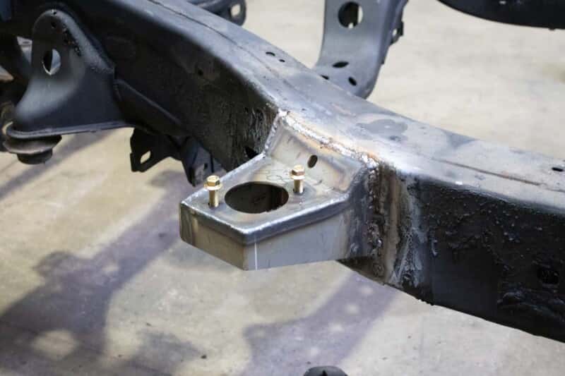 RustBuster — RustBust 05-15 Toyota Tacoma Access Cab and Crew Cab Front Body Mount Left - view 4