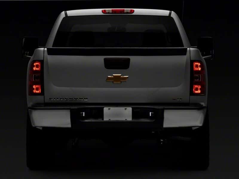 Raxiom — Raxiom 01-13 Chevrolet Silverado/GMC Sierra 1500 Axial Series LED License Plate Lamps- Smoked
Bulbs - view 6