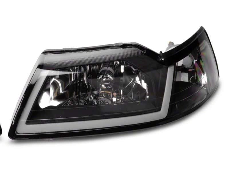 Raxiom — Raxiom 99-04 Ford Mustang Axial Series Headlights w/ LED Bar- Blk Housing (Clear Lens)
Headlights - view 2