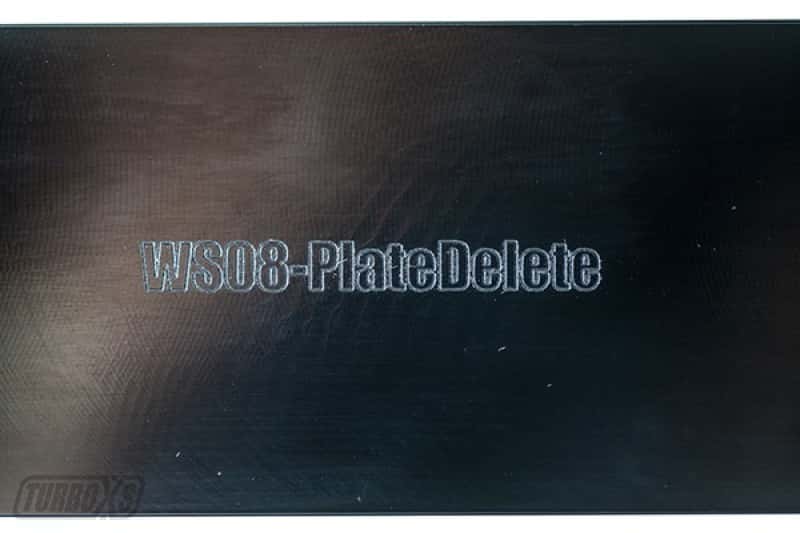 Turbo XS — Turbo XS 08-14 Subaru WRX/STi Billet Aluminum License Plate Delete Black Machined WRX Logo
License Cover - view 3