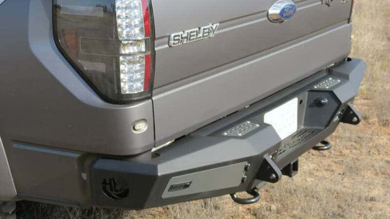 Addictive Desert Designs — Addictive Desert Designs 10-14 Ford F-150 Raptor HoneyBadger Rear Bumper w/ Tow Hooks
Bumper- Rear
Bumpers - view 6