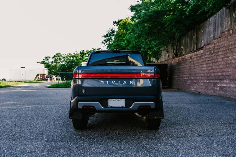 Rally Armor — Rally Armor 22-25 Rivian R1T Black UR Mud Flap w/Tangerine Scream Logo
Mud Flap - view 4