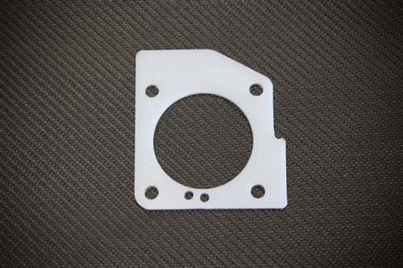 Torque Solution — Torque Solution Thermal Throttle Body Gasket: Mitsubishi Lancer Evolution 7 / 8 /9 - view 1