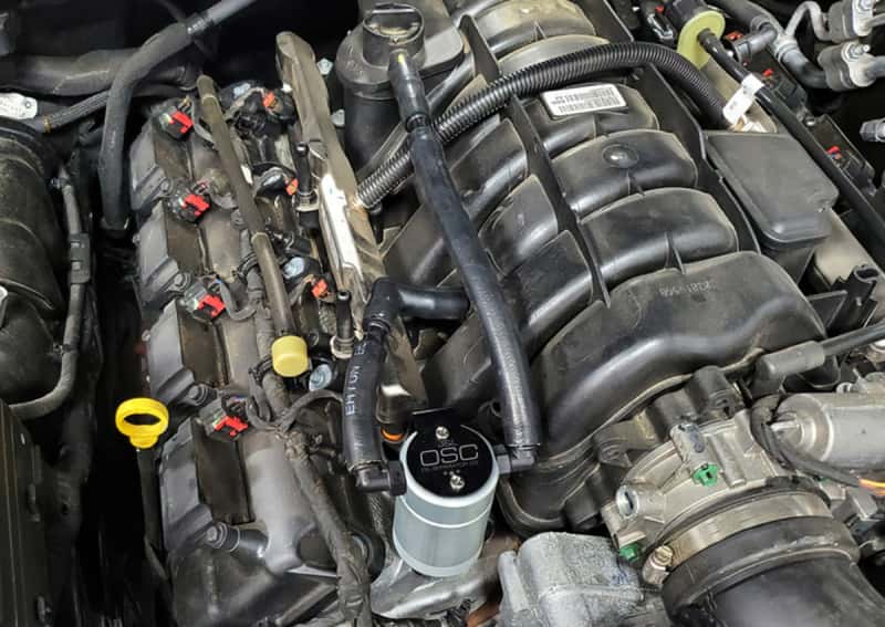 J&L — J&L 05-23 Dodge Charger 5.7L Hemi Passenger Side Oil Separator 3.0 - Clear Anodized
Oil Separator - view 2