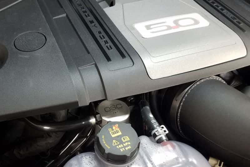 J&L — J&L 2018-2023 Ford Mustang GT Passenger Side Oil Separator 3.0 - Clear Anodized
Oil Separator - view 3