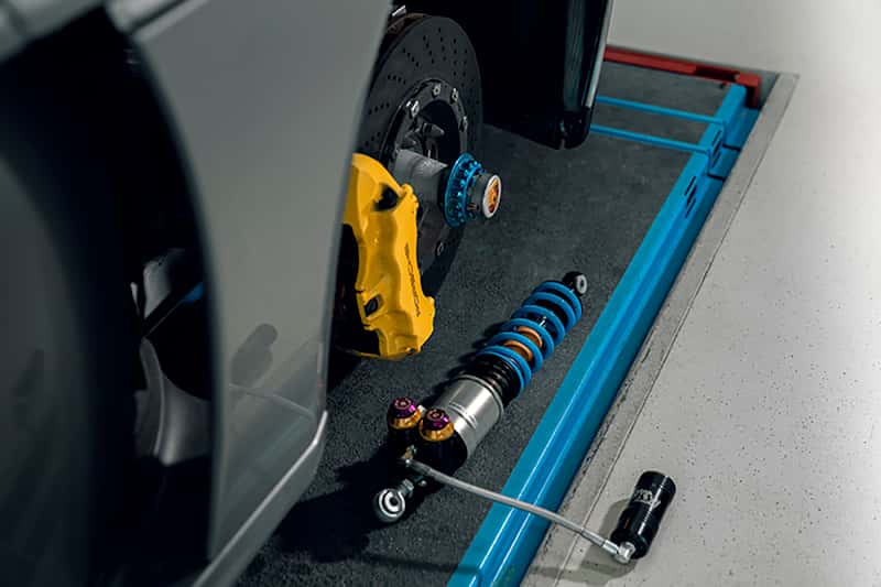 KW — KW 04-05 Porsche Carrera GT Special Edition HLS4 V5 Coilover Kit w/ Red & Blue Springs
Coilover Kit - view 4