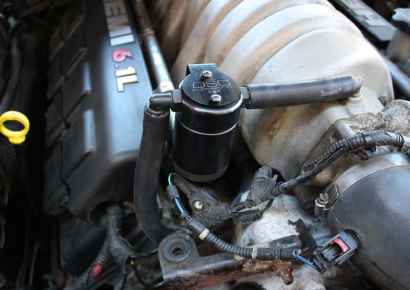 J&L — J&L 05-10 Dodge Charger 6.1L Hemi Passenger Side Oil Separator 3.0 - Black Anodized
Oil Separator - view 1