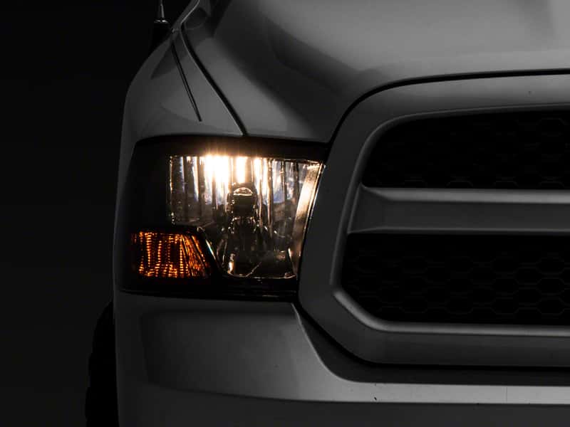 Raxiom — Raxiom 09-18 Dodge RAM 1500 Axial OEM Rep Headlights w/ Single Bulb- Chrome Housing (Smoked Lens)
Headlights - view 1