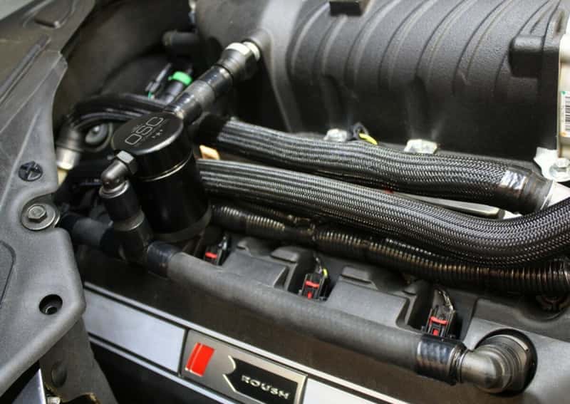 J&L — J&L 11-17 Ford Mustang GT (w/Roush/VMP S/C) Passenger Side Oil Separator 3.0 - Black Anodized
Oil Separator - view 1