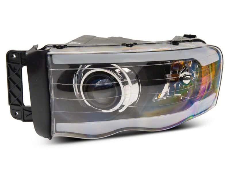 Raxiom — Raxiom 02-05 Dodge RAM 1500 LED Projector Headlights w/ SEQL LED Bar- Blk Housing (Clear Lens)
Headlights - view 3