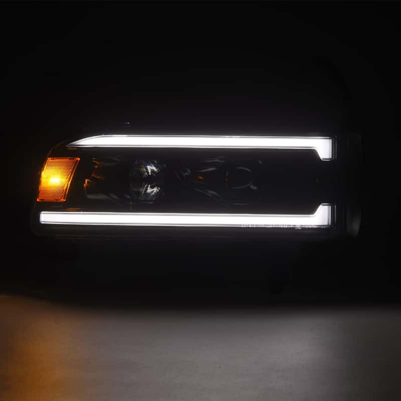 AlphaRex — AlphaRex 94-01 RAM 1500 LUXX LED Proj Headlights Alpha-Blk w/Activ Light/Seq Signal/SB DRL
Projector Headlights - view 1