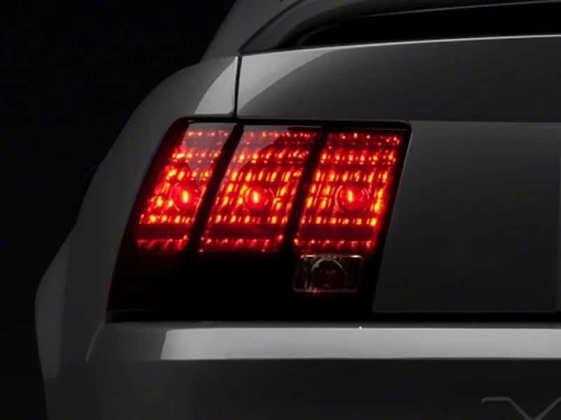Raxiom — Raxiom 99-04 Ford Mustang Excluding 99-01 Cobra Tail Lights- Black Housing (Smoked Lens)
Lights - view 2
