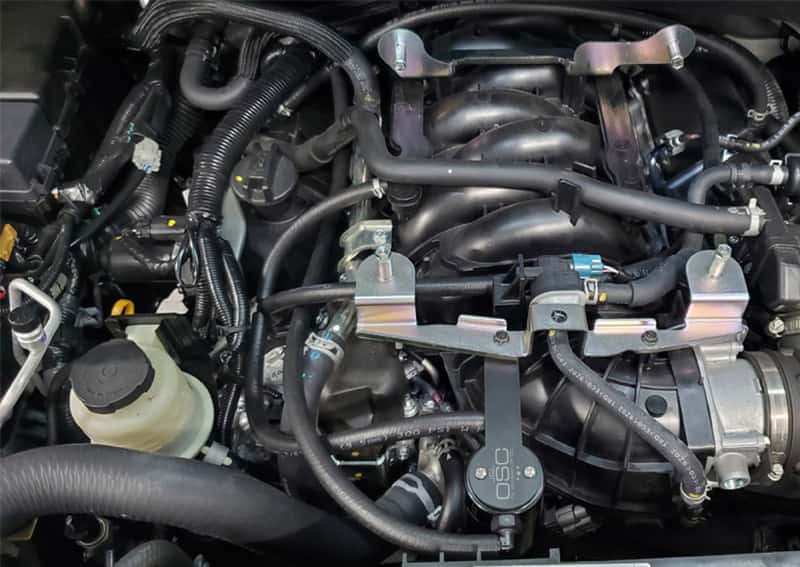 J&L — J&L 16-24 Nissan Titan 5.6L Passenger Side Oil Separator 3.0 - Black Anodized
Oil Separator - view 2