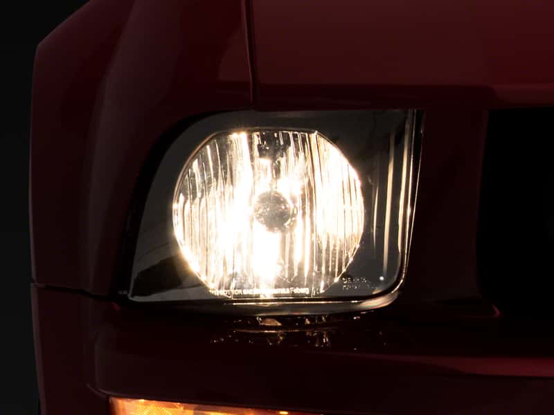 Raxiom — Raxiom 05-09 Ford Mustang Axial Series OEM Style Rep Headlights- Chrome Housing- Smoked Lens
Headlights - view 1