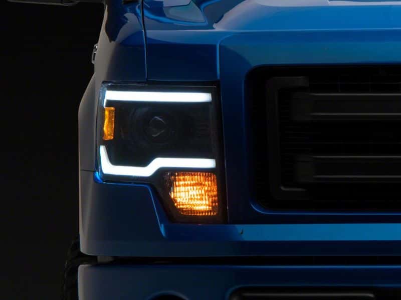 Raxiom — Raxiom 09-14 Ford F-150 Axial Series Projector Headlights w/ LED Light Bar- Blk Housing (Clear Lens)
Headlights - view 2