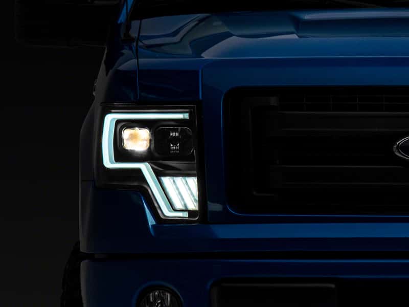 Raxiom — Raxiom 09-14 Ford F-150 Axial G4 Light Bar Switchback Projector Headlights- Blk Housing (Clear Lens)
Headlights - view 1
