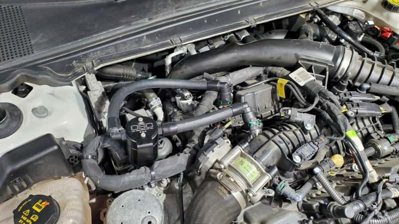 J&L — J&L 17-20 Lincoln Continental/MKZ 3.0L EcoBoost Passenger Side Oil Separator 3.0 - Black Anodized
Oil Separator - view 3