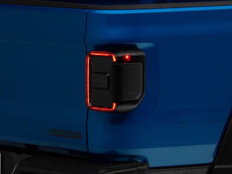 Raxiom — Raxiom 20-23 Jeep Gladiator JT w/ Factory Halogen LED Tail Lights- Blk Housing (Smoked Lens)
Lights - view 1