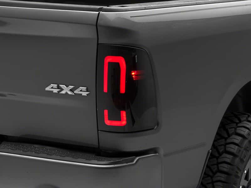 Raxiom — Raxiom 09-18 Dodge RAM 1500/2500/3500 Axial Series LED Tail Lights- Blk Housing (Smoked Lens)
Lights - view 1