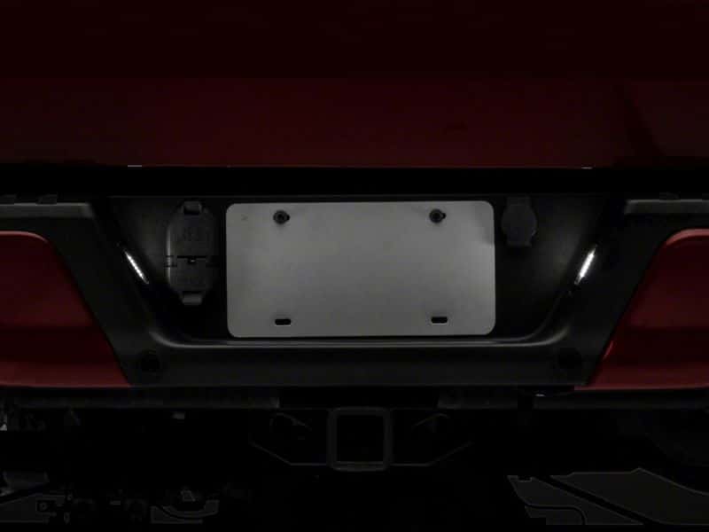 Raxiom — Raxiom 07-14 Ford F-150 Axial Series LED License Plate Lamps- Smoked
Bulbs - view 4