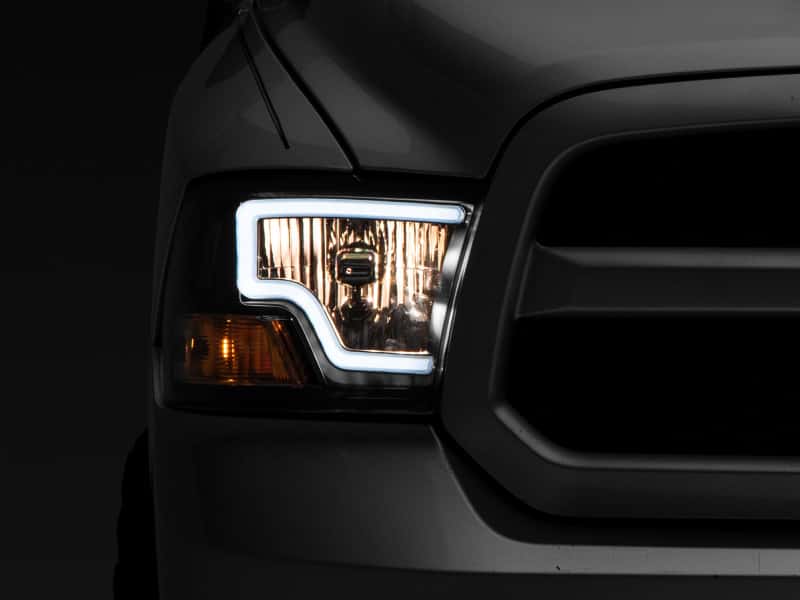 Raxiom — Raxiom 09-18 Dodge RAM 1500 LED Bar Headlights- Black Housing (Clear Lens)
Headlights - view 1