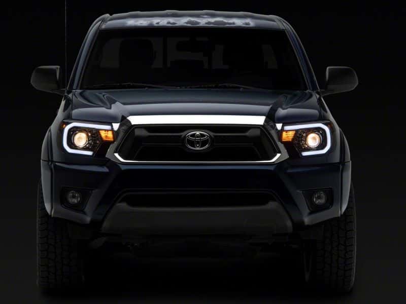 Raxiom — Raxiom 12-15 Toyota Tacoma Axial Projector Headlights w/ SEQL LED Bar- Blk Housing (Clear Lens)
Headlights - view 13