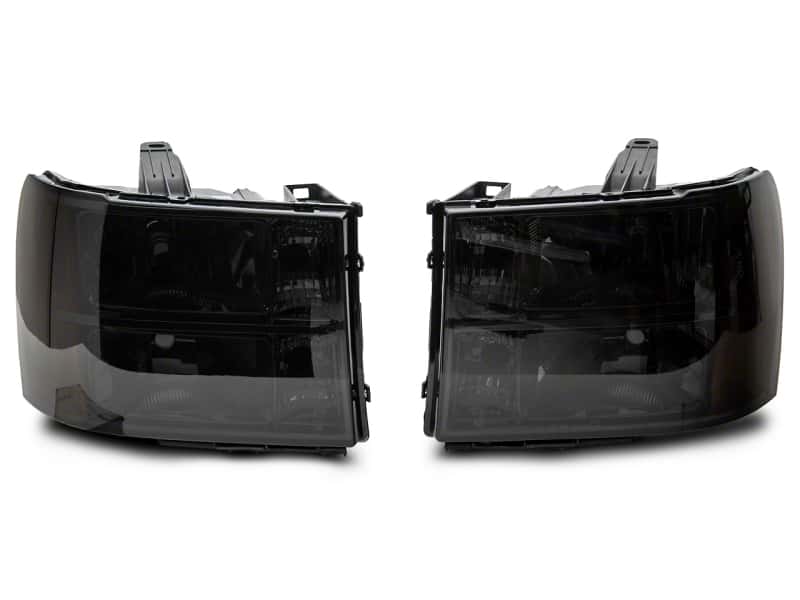 Raxiom — Raxiom 07-14 GMC Sierra 1500/2500 HD/3500 HD Axial OEM Rep Headlights- Chrome Housing- Smoked Lens
Headlights - view 1