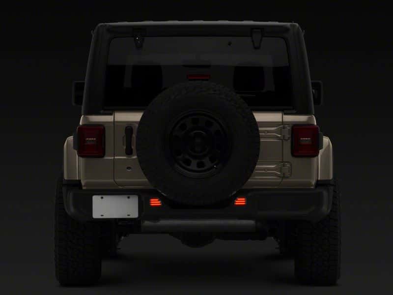 Raxiom — Raxiom 18-23 Jeep Wrangler JL Moab Rubicon Sahara Axial LED Rear Bumper Reflector Lights- Smoked
Lights - view 9