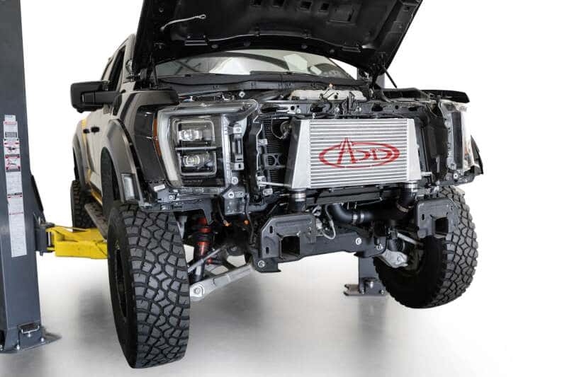 Addictive Desert Designs — Addictive Desert Designs 17-18 Ford F-150 Raptor aFe Intercooler Upgrade Kit
TChrgrIcoolerMount - view 3