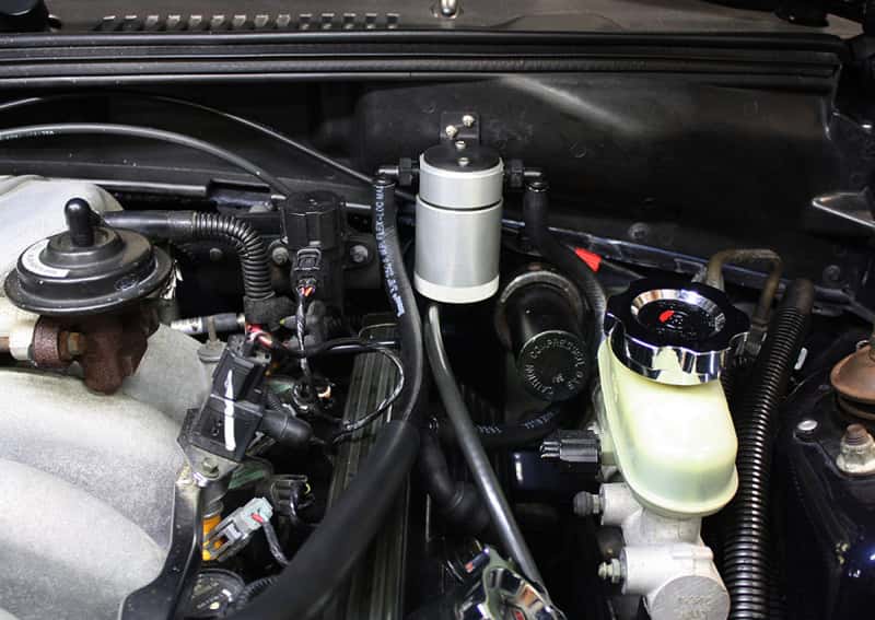 J&L — J&L 96-98 Ford Mustang SVT Cobra Driver Side Oil Separator 3.0 - Clear Anodized
Oil Separator - view 1