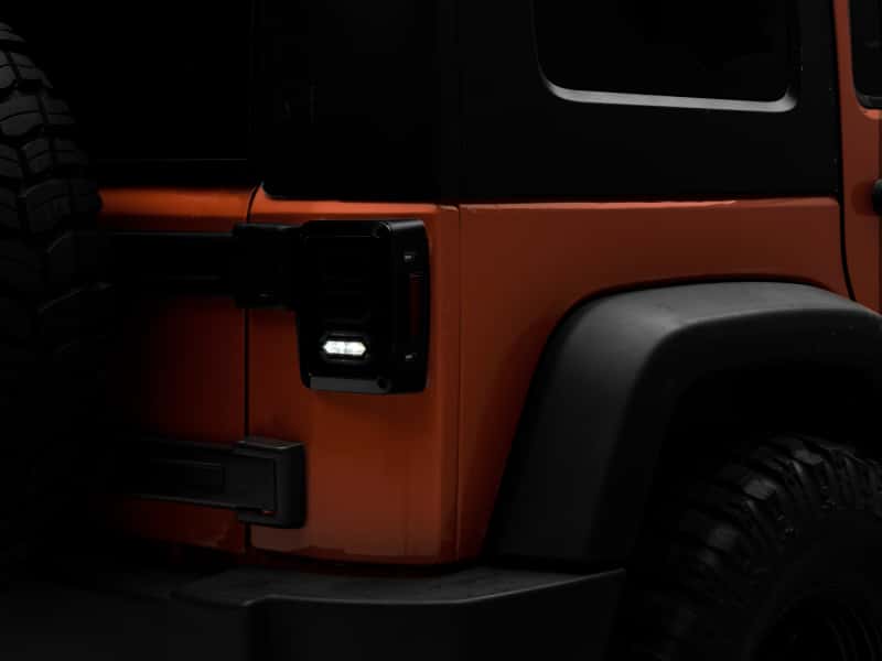 Raxiom — Raxiom 07-18 Jeep Wrangler JK LED Tail Lights- Black Housing (Smoked Lens)
Lights - view 2