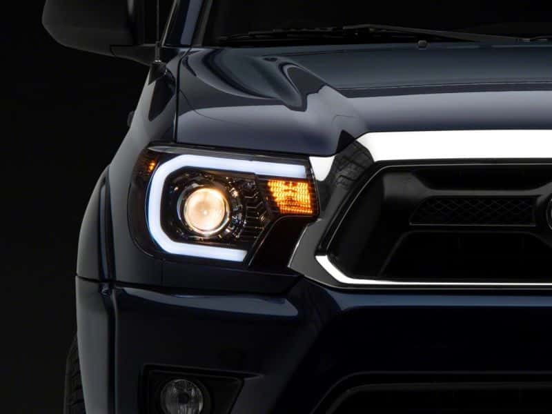 Raxiom — Raxiom 12-15 Toyota Tacoma Axial Projector Headlights w/ SEQL LED Bar- Blk Housing (Clear Lens)
Headlights - view 7