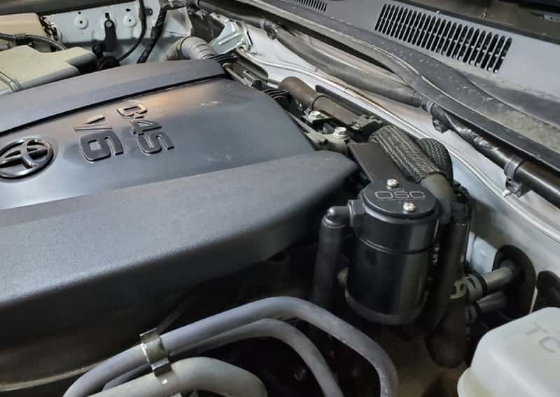 J&L — J&L 16-23 Toyota Tacoma 3.5L Driver Side Oil Separator 3.0 - Black Anodized
Oil Separator - view 2