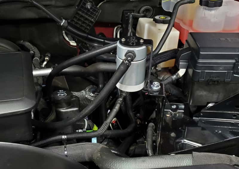 J&L — J&L 20-26 Chevy Silverado/GMC Sierra 2500/3500 6.6L Drivers Side Oil Separator 3.0 - Clear Anodi
Oil Separator - view 2