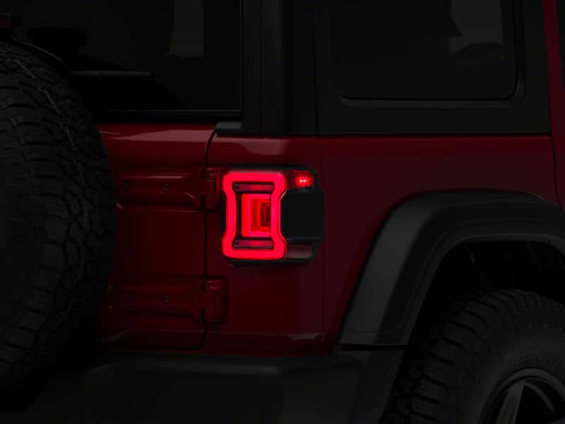 Raxiom — Raxiom 18-23 Jeep Wrangler JL Horizon LED Tail Lights- BlkHousing- Red Lens
Lights - view 1
