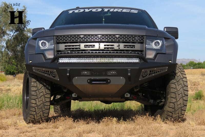 Addictive Desert Designs — Addictive Desert Designs 10-14 Ford F-150 Raptor HoneyBadger Front Bumper w/ Winch Mount
Bumper- Front
Bumpers - view 2
