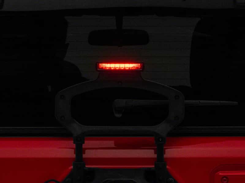 Raxiom — Raxiom 18-23 Jeep Wrangler JL Axial Series LED Third Brake Light- Smoked
Light - view 1