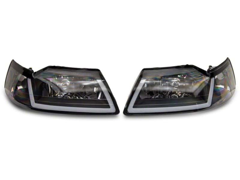Raxiom — Raxiom 99-04 Ford Mustang Axial Series Headlights w/ Sequential LED Bar- Blk Housing (Clear Lens)
Headlights - view 2