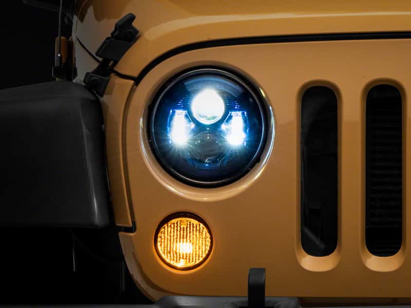 Raxiom — Raxiom 07-18 Jeep Wrangler JK 7-In LED Headlights- BlueHousing- Clear Lens
Headlights - view 1