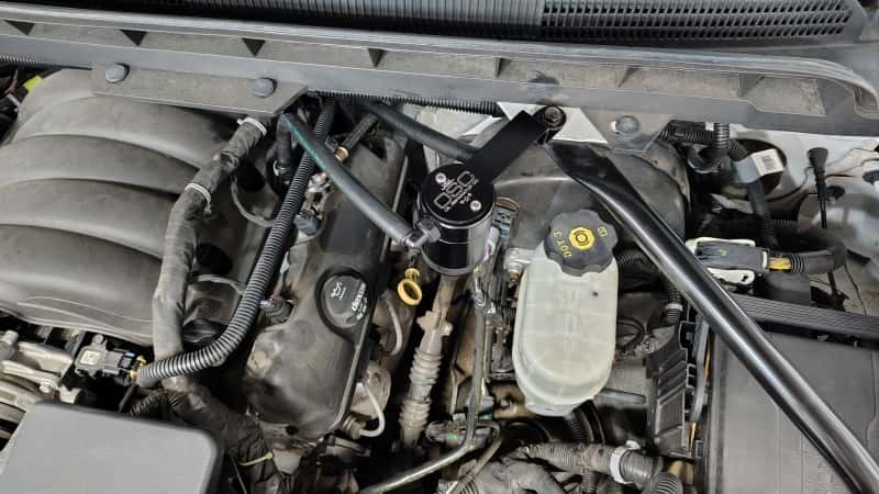 J&L — J&L 14-18 Chevy Silverado 1500 / 14-18 GMC Sierra 1500 4.3L V6 Oil Separator - Black Anodized
Oil Separator - view 2