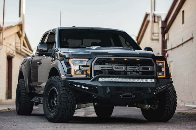 Addictive Desert Designs — Addictive Desert Designs 17-18 Ford F-150 Raptor HoneyBadger Front Bumper w/ Winch Mount
Bumper- Front
Bumpers - view 1