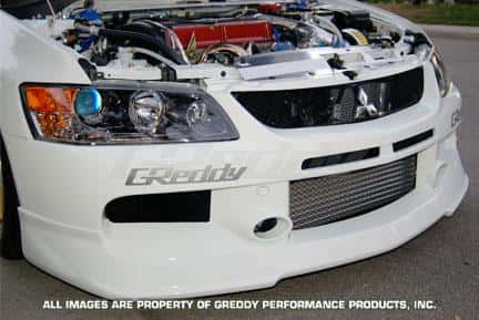 GReddy — GReddy 06-07 Mitsubishi Evolution IX Urethane Front Lip Spoiler  **Must Ask/Call to Order** - view 1