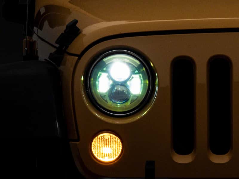 Raxiom — Raxiom 07-18 Jeep Wrangler JK 7-In LED Headlights Green Housing- Clear Lens
Headlights - view 1