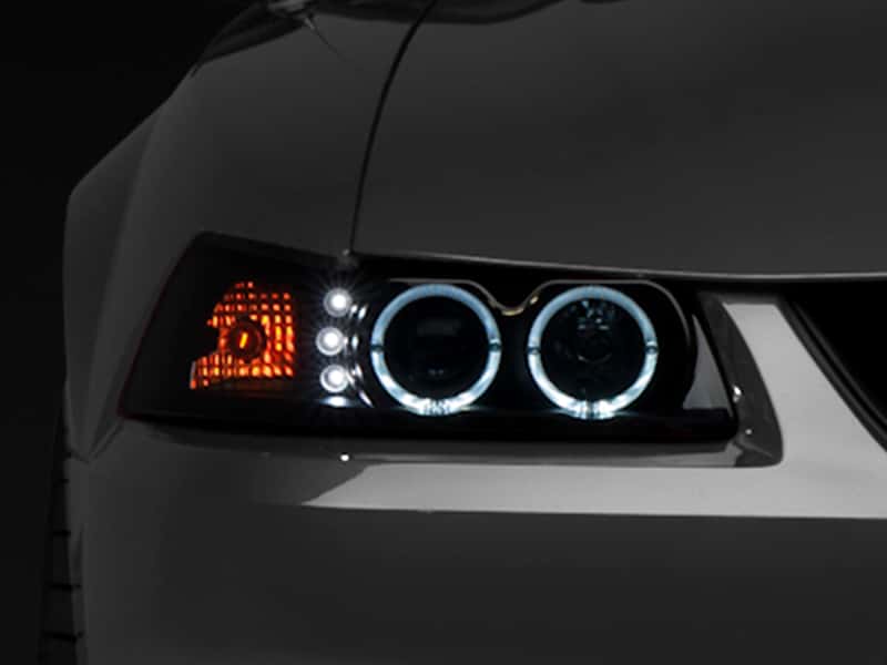 Raxiom — Raxiom 99-04 Ford Mustang Dual LED Halo Projector Headlights- Black Housing (Smoked Lens)
Headlights - view 2