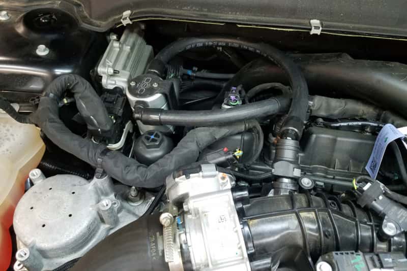 J&L — J&L 17-19 Ford Fusion Sport 2.7L Passenger Side Oil Separator 3.0 - Clear Anodized
Oil Separator - view 1